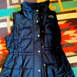 North Face vest size M. Draw string waist.